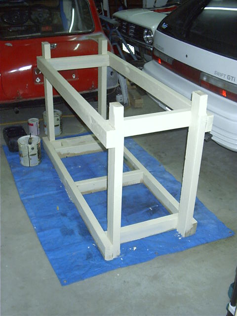 Dad paints the bench frame