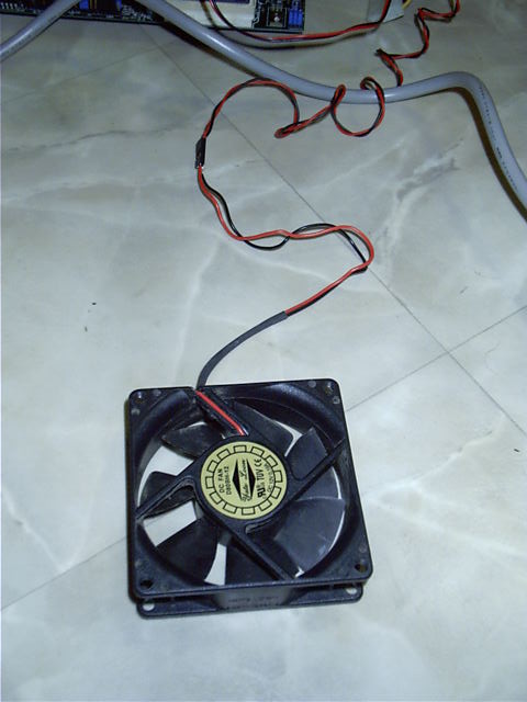 A spare fan pulled from a PSU might add extra coolage
