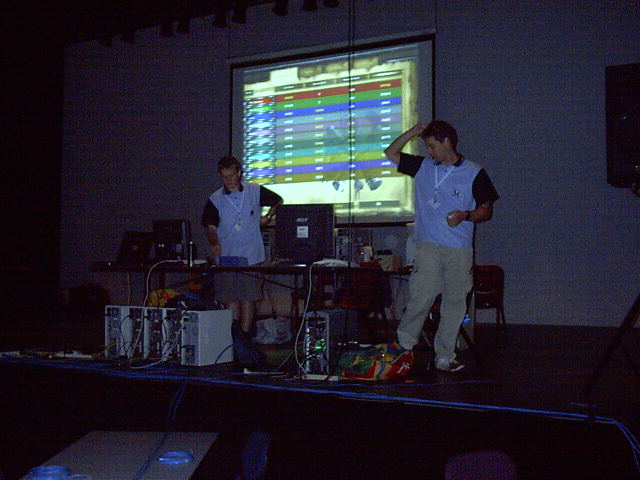 Shawn puts his laptop on the projector