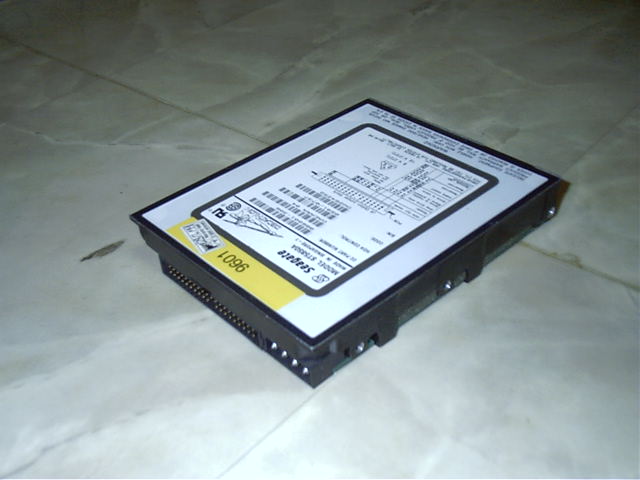 The smallish 850mb HDD it came with, soon to be replaced with a IBM 45gb