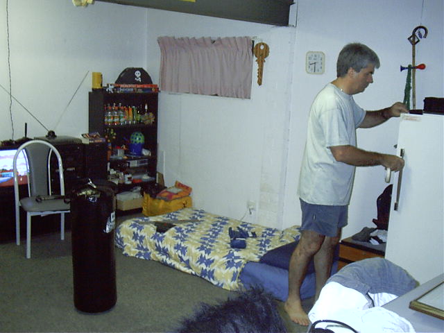 Dad fixes door.