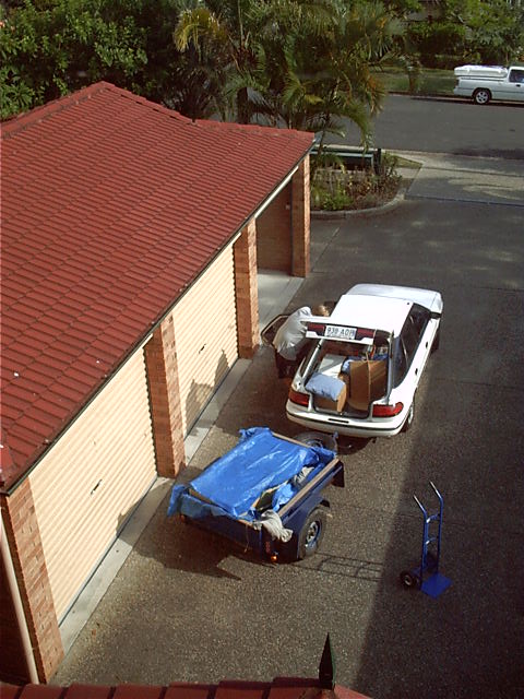 Pat unpacks more stuff from the car.