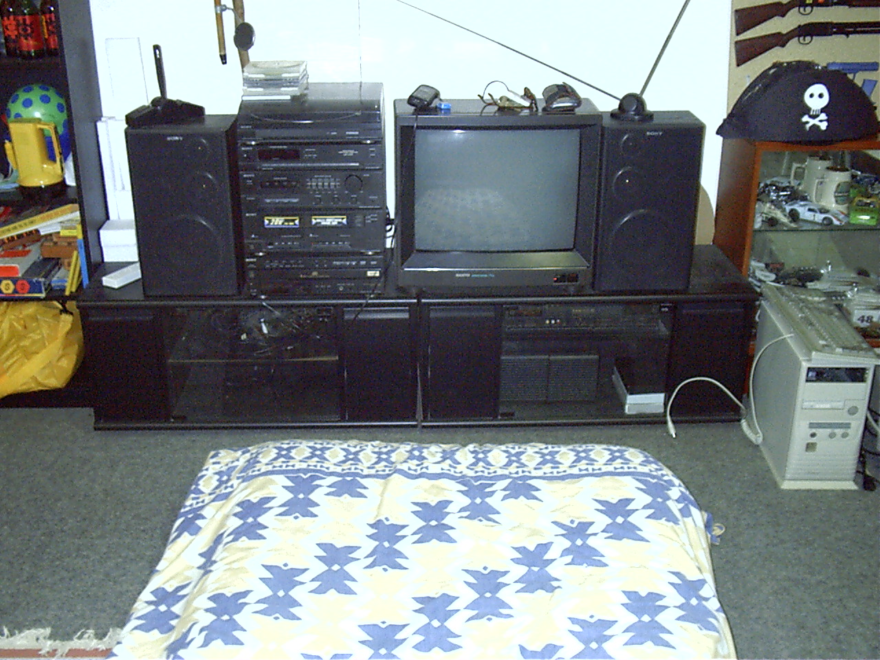 My TV and stereo. (Also my P133 down bottom right, ready to be Linux'd)