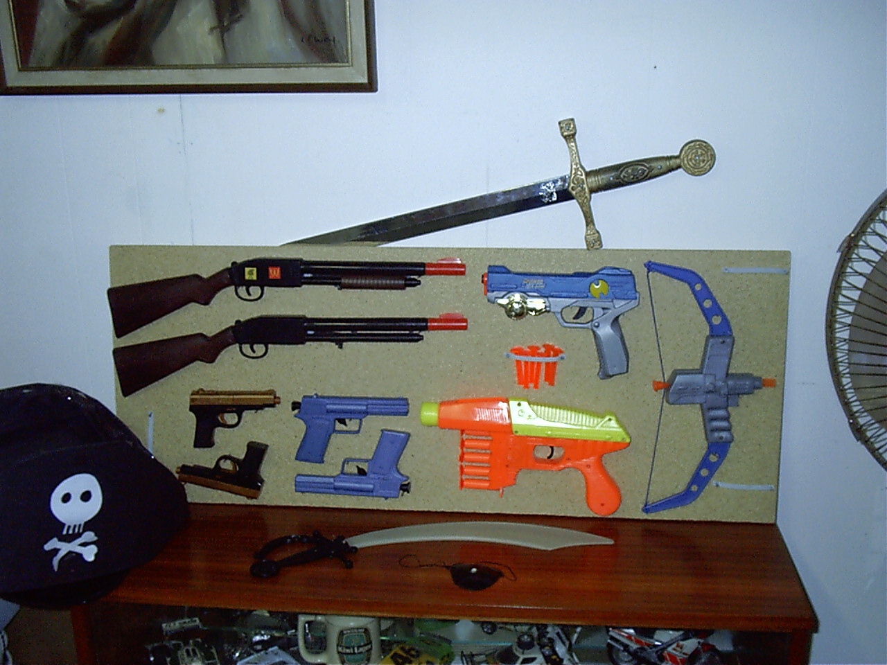 My gun rack. (And pirate hat)