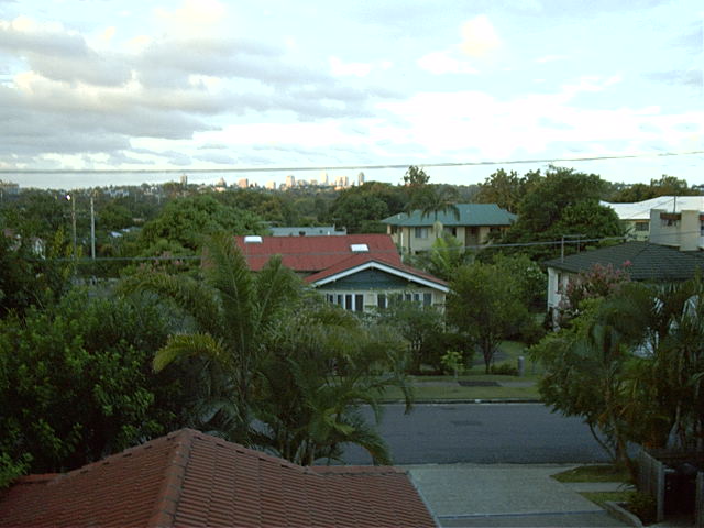 View of the sun setting on the city.
