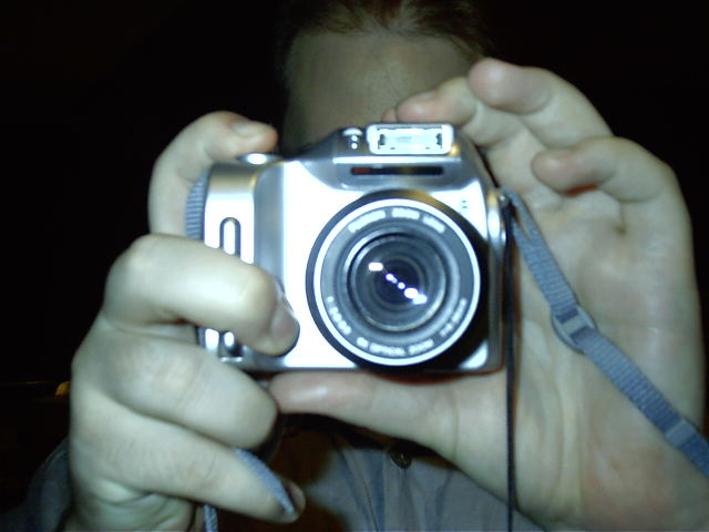 Dilbert's digital camera is bigger than mine.