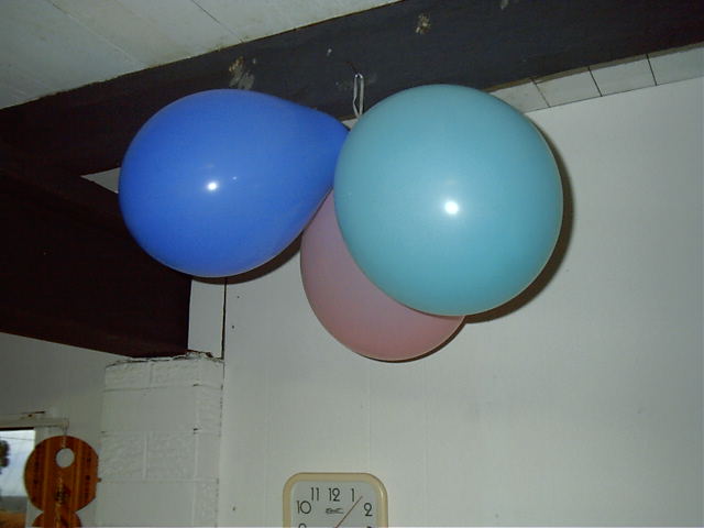 Katie spent an hour blowing up balloons.