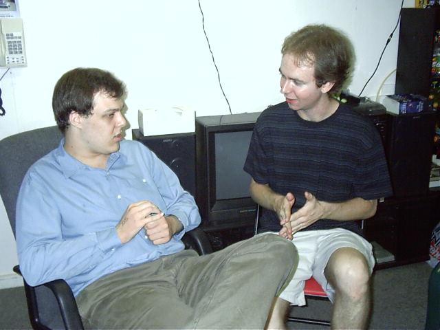Kewn explains to Dewi the Art of War.