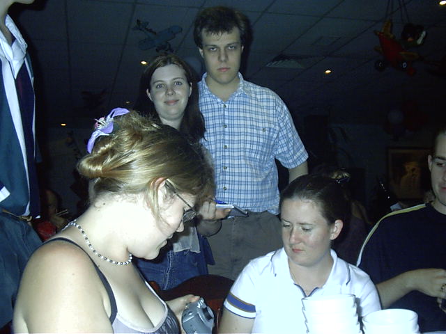 Tanya and Dewi stopped by to say hi. Poet gets the camera.