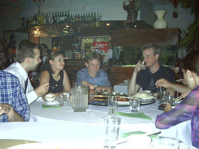 The other end of the table. I dare not say more.