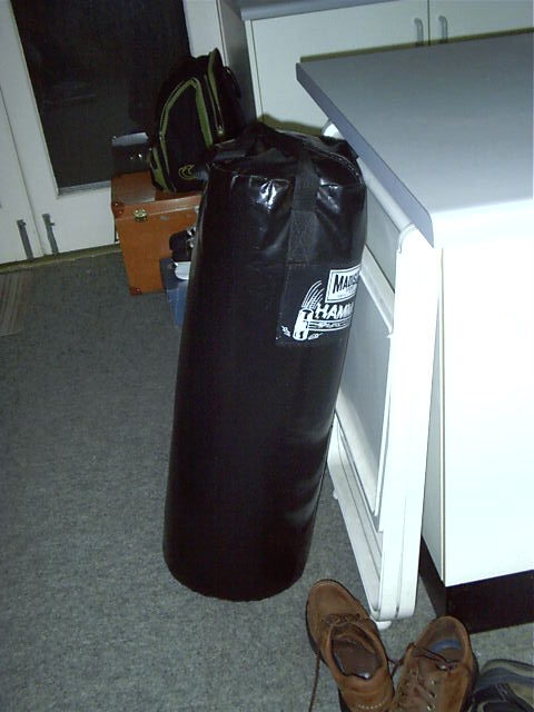 The punching bag needs to be re-hung
