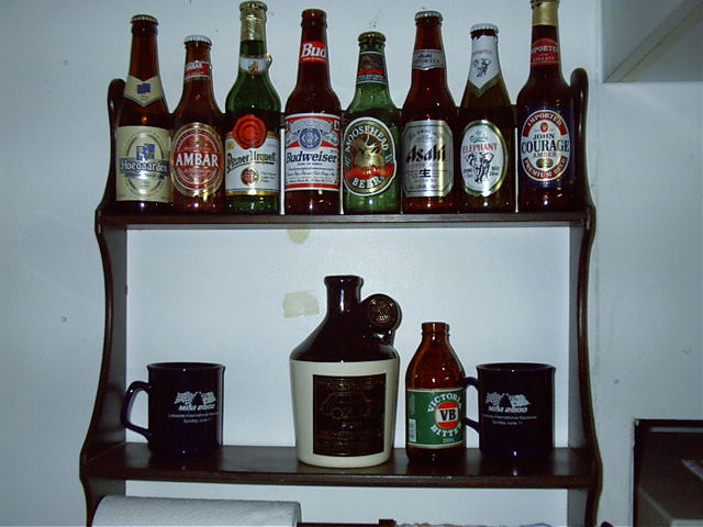 Dad's bottle collection. Beers from afar.