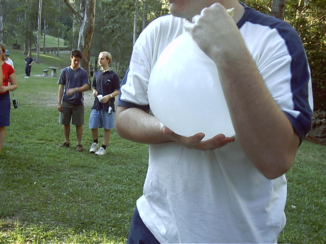 Fatty has a water balloon, a big one.