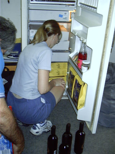 Megan sorts out one of the 3 fridges