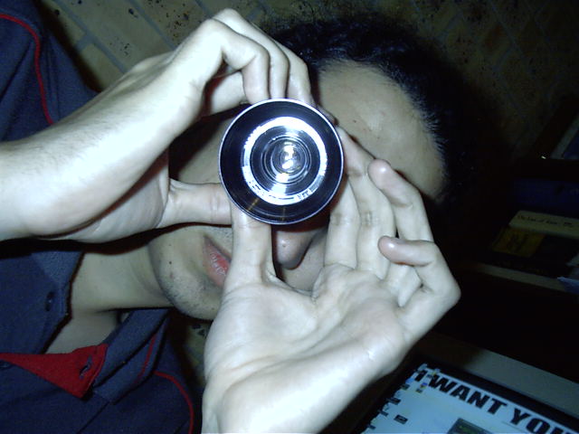 Mental note, never look though a lens when someone has a bright flash on his camera