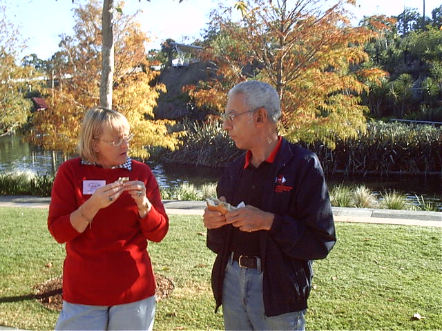 Mum talks to another member