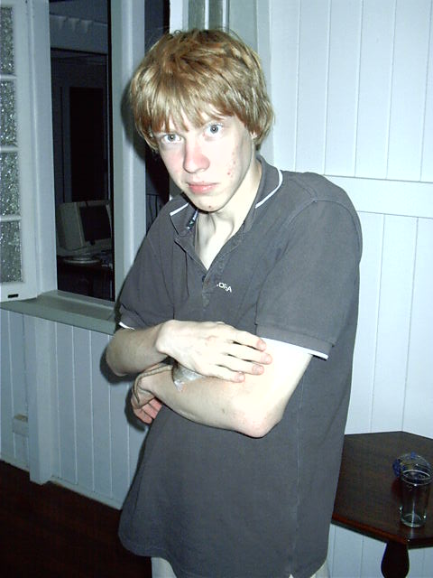 Dewi's brother and his pet rat.