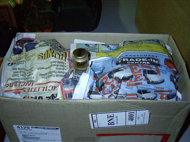 The bottles of drink get packed