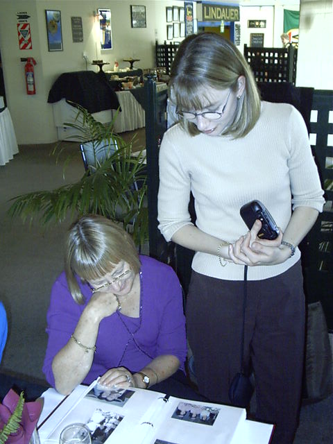 Mum and Megan look at old photo's