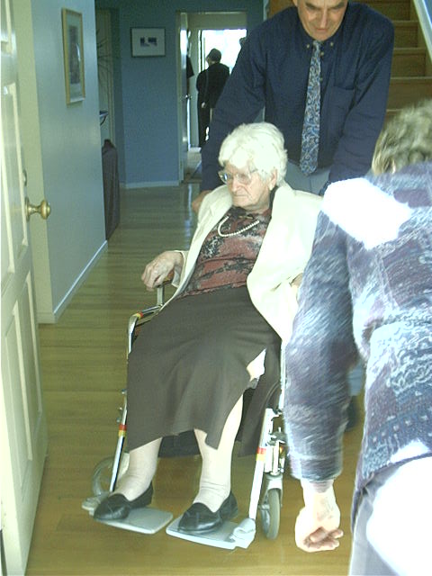 Warren helps Nana out to the back area