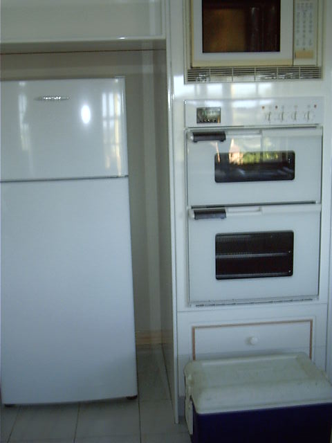 The fridge and oven and microwave