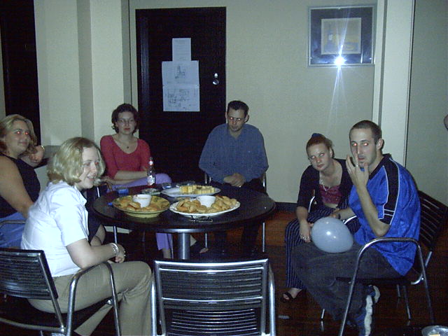 Party people. I went to highschool with the evil looking guy in middle