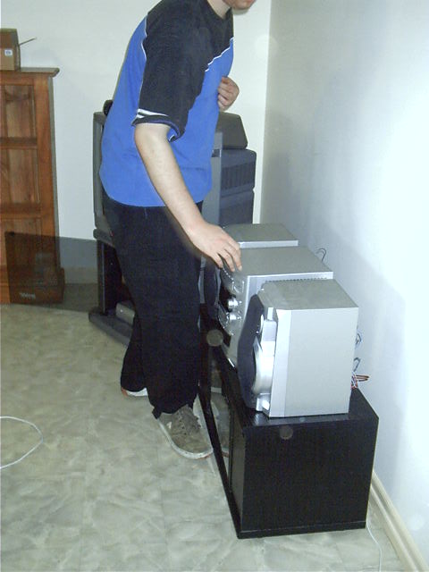 Draxy helps set up the stereo