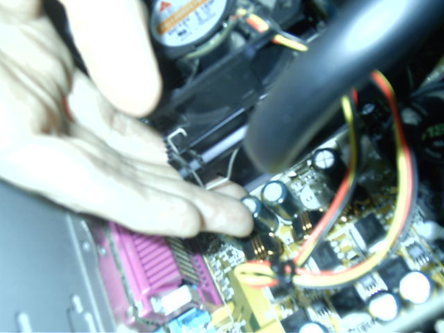 Seeing how i can touch the heatsink next to the CPU