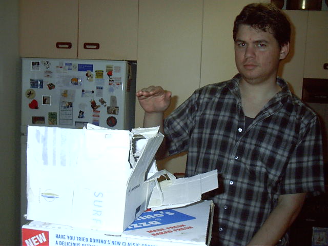 Draxy checks out the remains of my carboard leechbox design