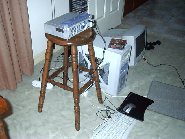 Draxy connects up computer to projector for leeched-anime viewing