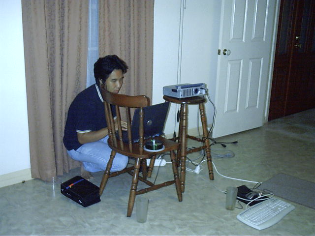 Steve plays on his laptop