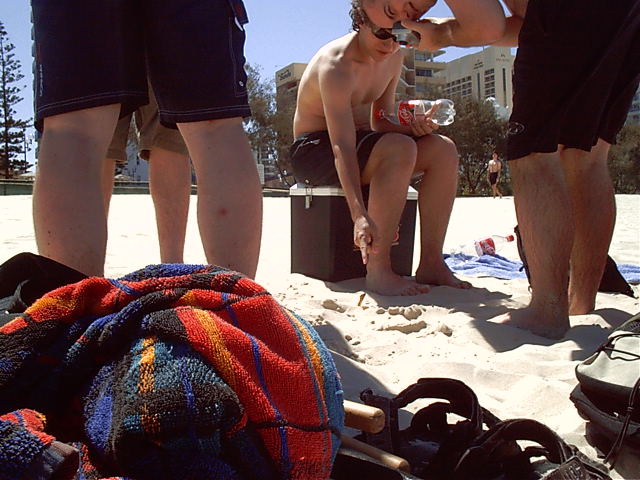 Oh dear, glass in the sand