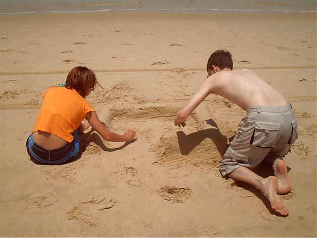 Lui and me making a sandcastle