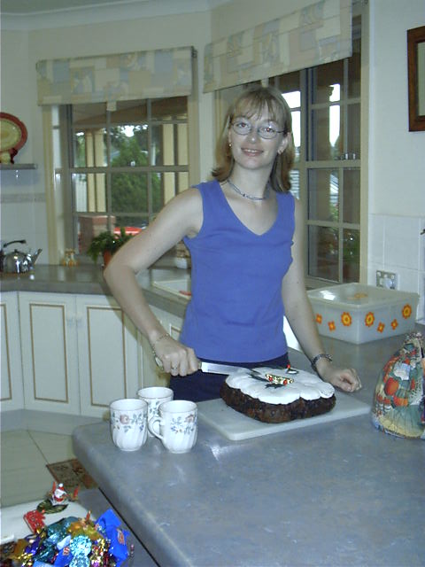 Megan cuts her cake
