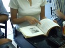 Lui checks out a book on how to handle leopard attacks