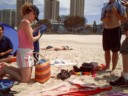 Many sun bathers around, some topless (this one is not)