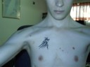 Tattoo #1. It's a Dragon. (Sorry about the naked me)
