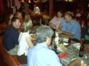 From other end of table