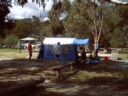 After arriving and picking a spot, the tent goes up