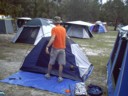 Paul puts up Megan's tent for them