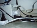 2 plugs on back and a com port connection to monitor UPS