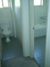 Toilet and bathroom.