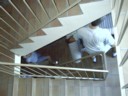 The couch is carried up 4 small flights or stairs to 3rd floor.