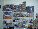 My bookshelf in my 'actual' room upstairs. (I have not slept there in years)