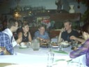 The other end of the table. I dare not say more.