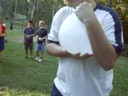 Fatty has a water balloon, a big one.