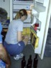 Megan sorts out one of the 3 fridges