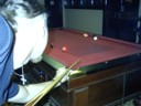 Moments before the camera man is disabled by a pool que to the jewels.