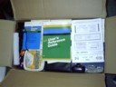 Box of Texas Instrument computer books and other general crap