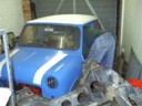 Dad packs the garage into the mini